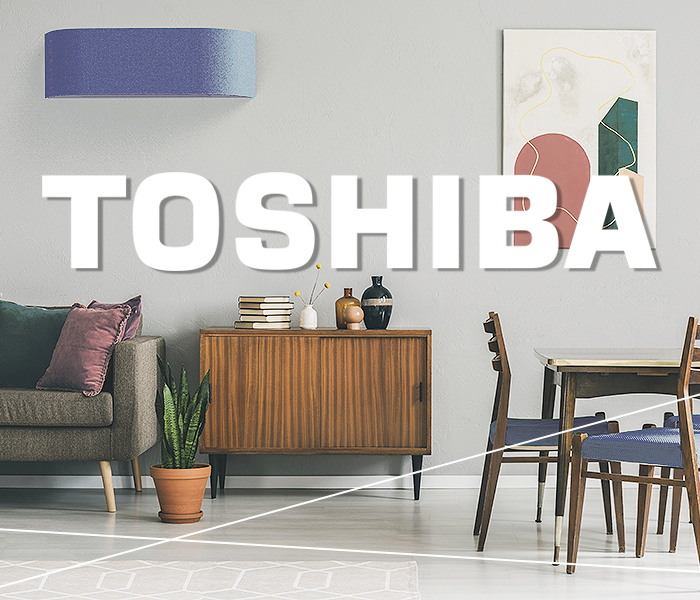 Toshiba Klimaanlagen - Wohnzimmer mit Essecke und Wandgerät unter Logo Schriftzug von Toshiba
